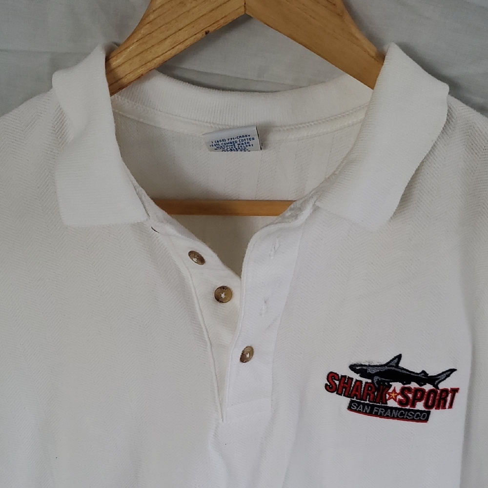 White Polo Shirt with Embroidered Chest Logo